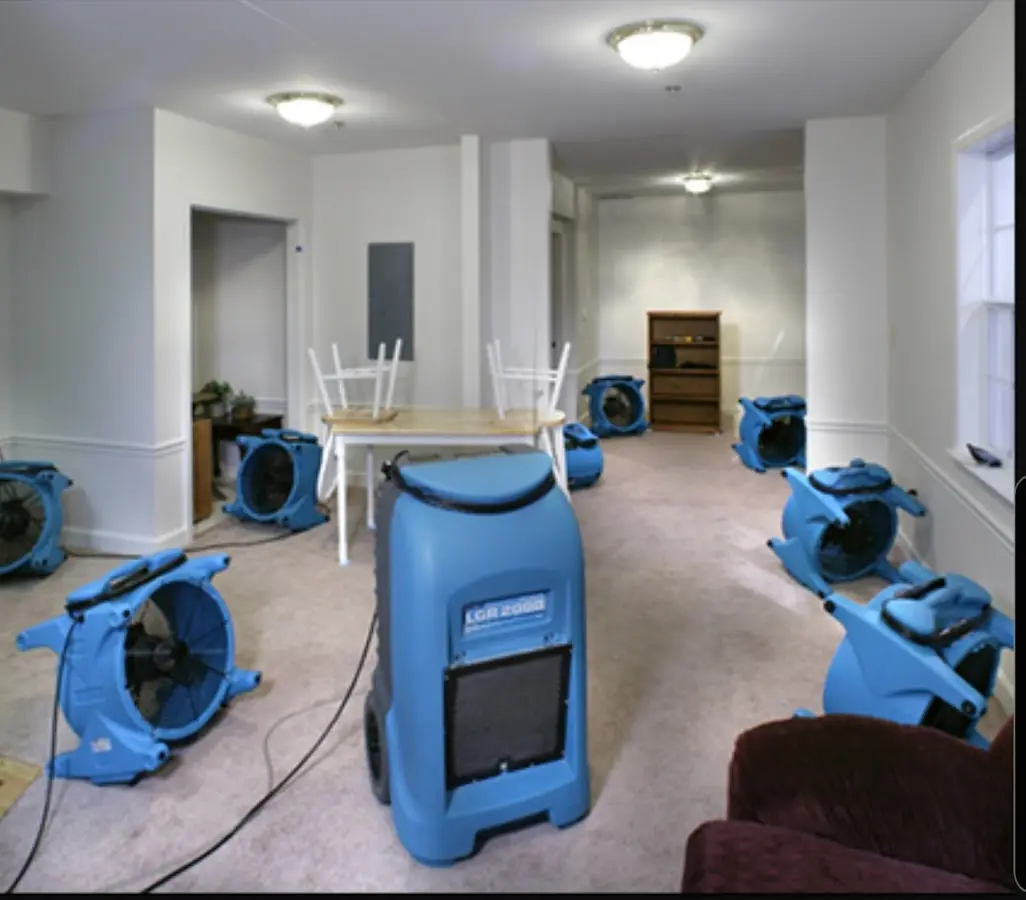 Air movers and dehumidifier setup for Water Extraction & Removal in Godley